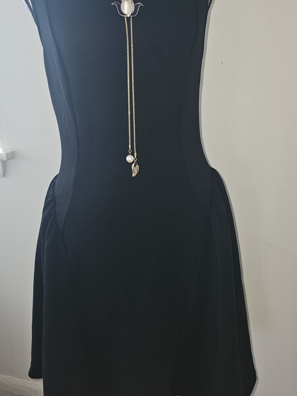 Elegant Black Mini Dress with Flared Skirt
